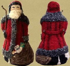 two knitted santas sitting next to each other