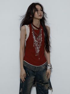 Revamp your wardrobe with this standout chains print red punk rock top. This unique piece features a clever fake two-piece design, giving you a layered look without the bulk. The edgy chains print adds a rebellious flair, while the tassel hem brings a touch of boho chic to the punk aesthetic. Perfect for making a bold fashion statement, this top is a must-have for anyone looking to blend edgy and eclectic styles seamlessly. Pair it with your favorite ripped jeans or a mini skirt to complete the Red Punk Outfits, Punk Style Red Tops For Alternative Fashion, Red Punk Tops For Streetwear, Red Punk Party Tops, Red Punk Top With Graphic Print, No Romance, Boho Market, Rock Tops, Chain Top