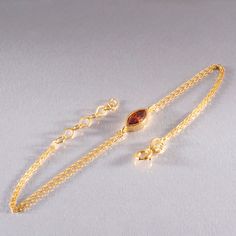 Brighten your style with the warm glow of our Bezel Marquise Cut Citrine Bracelet, featuring the radiant November birthstone. Known as the stone of abundance and positivity, citrine adds a cheerful and elegant touch to this minimalist design. Set in luxurious 14K solid gold, this bracelet is perfect for those who appreciate timeless beauty and simplicity, making it an ideal gift for birthdays, anniversaries, or Christmas. 🌟 Product Highlights Marquise cut citrine  Adjustable bracelet length with extender 14K solid gold in Yellow, White, or Rose Gold Secure and chic bezel setting November birthstone symbolizing abundance, success, and joy 💎 The Citrine This bracelet showcases a stunning marquise cut citrine, renowned for its warm, golden hue. As the birthstone of November, citrine is trad November Birthstone Bracelet, Citrine Meaning, Citrine Earrings Studs, Citrine Bracelet, Citrine Jewelry, Citrine Earrings, Citrine Necklace, November Birthstone, Minimalist Bracelet