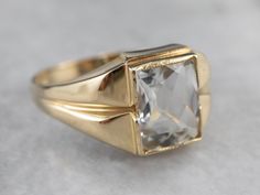 This Retro Era ring is full of refined sophistication! The white topaz at the center is pineapple cut for maximum sparkle and shine. Sleek shoulders and subtle milgrain on the bezel setting are particularly nice details! Metal: 10K Yellow Gold Gem: White Topaz approximately 4.00 Carats Gem Measurements: 7.9 x 9.8 mm, Rectangle Pineapple Cut Ring Size: 10.25 Marks: "10K" Stamped on the inside band Bezel Set Wedding Ring, Vintage Gold Ring, Vintage Gold Rings, Statement Rings Diamond, Retro Era, Single Ladies, Mens Gold Rings, Bezel Set Ring, Ring Bezel