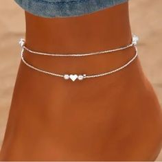 Dainty Heart Silver Toned Anklet Features Block Style Hearts With Silver Toned Beads On A Sleek Silver Toned Chain. Approx. 8.5” In Length With A 2” Extension Also Available In Gold Toned And Rose Gold Toned. See My Other Listings For More Jewelry. Bundle And Save On Shipping. #A33 Silver Anklets For Valentine's Day Party, Silver Heart Anklets For Party, Trendy Anklets For Valentine's Day, Elegant Heart-shaped Anklets For Party, Elegant Heart-shaped Party Anklets, Elegant Valentine's Day Party Anklets, Trendy Silver Anklets For Summer, Elegant Silver Anklets For Valentine's Day, Silver Anklets With Heart Charm For Valentine's Day