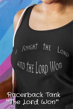 a woman wearing a black tank top with the words i fought the lord and the lord won