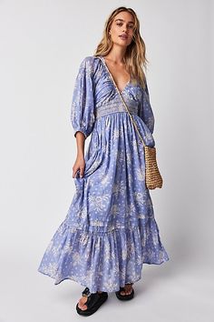 The perfect dress for any occasion featured in a forever timeless print. **Fit:** Billowy, V-neck silhouette **Features:** Exaggerated sleeves, defined waistband, ruffled hemline, fully lined **Why We | Golden Hour Maxi Dress by Free People in Blue, Size: S Bohemian Floral Dress, King Style, Long Flowy Dress, Reunion Ideas, Modest Style, Exaggerated Sleeves, Womens Long Dresses, Flower Skirt, Langer Rock