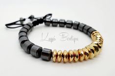 Beautiful luxury bracelet, handcrafted by myself, to a very high standard, using premium 8-10mm Hematite beads in contrasting gunmetal and gold plating. This is a 33 bead Tasbih bracelet, and can be used for dhikr when removed from the wrist.  **The beads are knotted at either end to hold them in place so they do not move along the cord, however I can make it without the knots so that they can be freely moved along the cord if you prefer (easier for larger fingers to access the beads), if you pr Hand-strung Hematite Beaded Bracelets, Hematite Bracelets With Spacer Beads For Gift, Hematite Bracelet With Spacer Beads For Gifts, Hematite Spacer Beads Bracelets As Gift, Hematite Beaded Bracelets With Faceted Beads, Adjustable Gold Hand Wrapped Rosary Bracelet, Adjustable Polished Hematite Beads, Handmade Hematite Spiritual Bracelets, Adjustable Hand-strung Hematite Beaded Bracelets