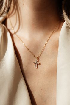 Maximize your style with the Ophelia Diamond Cross Necklace - a statement piece that is both water and tarnish resistant. Perfect for stacking, this beautiful cross necklace will take your look to the next level. Crafted with care, so you can make it an everyday staple. MATERIAL: 18k PVD Gold plated, Stainless steel, Cz LEGNTH: 18" Water resistant, tarnish resistant, hypoallergenic, & nickel/lead free. Luxury Elegant Cross Necklace, Cross Necklace Aesthetic, Golden Cross Necklace, Gold Necklace Cross, Gold Cross Necklace For Women, Diamond Cross Earrings, Gold Diamond Cross Necklace, Diamond Cross Necklace Gold, Diamond Cross Necklace