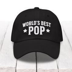 DESIGN Surprise Grandpa with our World's Best Pop Hat! This personalized embroidered cap is the perfect Father's Day gift. Crafted with high-quality materials, our custom dad baseball cap is comfortable and stylish. Show Dad how much he means to you with this thoughtful present for Father's Day or any occasion, make his day extra special with this embroidered hat.  DELIVERY TIMES / INFORMATION It takes 2-5 days to produce and fulfill hat orders at a fulfillment center based on your shipping dest Pop Hat, Fulfillment Center, Father Presents, Trendy Hat, Embroidered Cap, Fathers Day Presents, Embroidered Hat, Love Hat, Embroidered Caps