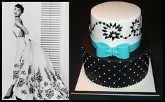 a black and white cake with a woman in a dress next to the same cake