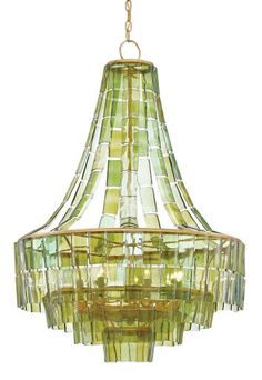 a green chandelier hanging from a gold colored ceiling fixture with glass squares on it