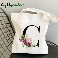 Summer New Flower Letter Bolsa Feminina Shoulder Canvas Bags Large Capacity Wild Messenger Bag Cute Spring Tote Shoulder Bag With Letter Print, Spring Letter Print Tote Shoulder Bag, Casual Spring Shoulder Bag With Letter Print, Trendy Spring Canvas Bag With Letter Print, Trendy Letter Print Canvas Bag For Spring, Casual Letter Print Bag For Spring, White Rectangular Shoulder Bag With Letter Print, Spring Letter Print Bags For Daily Use, Letter Print Travel Bags For Spring