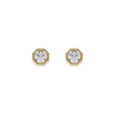 Classic Round Diamond Studs made with round brilliant-cut diamonds and set in an octagonal bezel setting. Details: - Made to Order- Focal Diamond Weight: 0.10 CT, 0.20 CT, 0.30 CT- Diamond Cut: Round- Diamond Type: Lab Grown Diamond (CVD, HPHT)- Diamond Clarity: (DEF) (0.10 CT - 0.49 CT), VS (0.50 CT - 1.00 CT)- Diamond Color: VS- Setting Type: Bezel- Metal Type: 14K Solid Gold,18K Solid Gold- Choice of Gold Color: Yellow Gold, White Gold, Rose Gold- Jewelry Certification: Jewelry priced above $ Anniversary Diamond Earrings With Octagon Accents, Elegant Octagon Diamond Earrings With Accents, Elegant Octagon Prong Set Diamond Earrings, Octagon Diamond Cut Earrings For Anniversary, Elegant Octagon Diamond Earrings With Prong Setting, Octagon Diamond Cut Earrings, Diamond Brilliant Cut Octagon Earrings, Diamond Earrings With Brilliant Cut In Octagon Shape, Diamond Octagon Earrings With Brilliant Cut