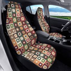 the interior of a car is decorated with multicolored squares and crochet