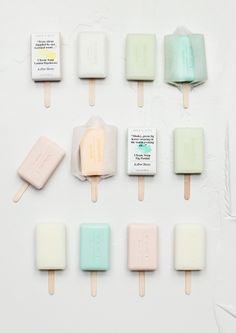 several popsicles are arranged in rows on top of each other, with different flavors