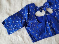 Blouse stitched - Yes Blouse Opening - Back Sleeves Length - Elbow Padded - No Blouse size - 40 with inner margins expandable upto 46 For Blouse Size 38 alteration can be done on request. Blue Cotton Padded Blouse Piece, Blue Cotton Blouse For Wedding, Elbow Pads, Raw Silk, Sleeve Length