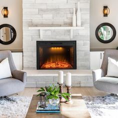 a living room with two chairs and a fire place in the middle of the room