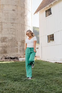 THIS SALE ITEM IS FINAL SALE Experience unbeatable comfort and effortless style with the Devon Pants-Green. Soft and lightweight, they feature an elastic waist and adjustable tie for the perfect fit. Side pockets and a wide-leg cut complete their sporty look, giving you the perfect combination of function and fashion. *Elastic waist; waist tie* Material Content: 90% Polyester // 10% Spandex Material Pattern: Solid// Side stripe Model is wearing a small Click here for top Not sure what size? See Green Boutique, Pants Green, Green Soft, Clothing Casual, Sporty Look, Side Stripe, Waist Tie, Devon, Boutique Clothing