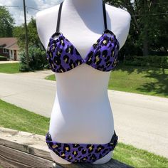 Purple Cheetah Slide Triangle Top With Black Wooden Hoops. Ruched Hipster Bottom Features Black Wooden Hoops At Hips. Size Small. New Without Tags Boutique Item. Fitted Purple Swimwear For Vacation, Fitted Purple Swimwear For Beach Season, Purple Fitted Triangle Top Swimwear, Adjustable Purple Beachwear Swimwear, Adjustable Purple Swimwear For Beach, Adjustable Purple Swimwear For Vacation, Adjustable Purple Swimwear For Swimming, Fitted Purple Swimwear For Beach, Purple Triangle Top Swimwear For Festival