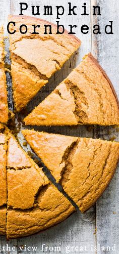 a pumpkin cornbread cut in half on top of a wooden table with text overlay