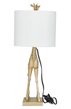 Illuminate your space with a touch of style. Perfect for any room, this table lamp will make a refreshing and stylish addition to your space. 11" x 10" x 23" lamp; 76" cord Textile/synthetic/metal Imported Giraffe Lamp, Concert Looks, Outdoor Running, Flip Flop Slippers, Home Decor Lights, Sports Blazer, Suit Shop, Casual Streetwear, Comfortable Dress