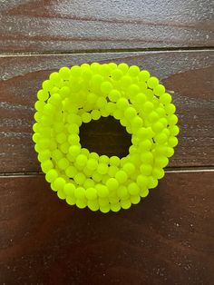 Super cute fun and bright neon beaded bracelet. Classic neon green color glass beaded bracelet with our new round beads. Matte finish in size 7 inches. Need a different size? Message us! Neon Jewelry, Neon Green Color, Neon Bracelets, Neon Style, Glass Beaded Bracelet, Yellow Bracelet, Neon Fashion, Glass Beaded Bracelets, Neon Yellow