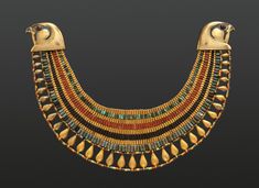 an egyptian necklace with gold and multicolored beads, possibly from thebestan period