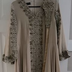 Worn Once Size M Beige Color Elegant Cream Dress With Traditional Drape, Festive Elegant Long Dress Abaya, Festive Elegant Long Abaya, Beige Long Dress For Eid, Long Beige Dress For Eid, Long Beige Dresses For Eid, Floor-length Beige Abaya For Eid, Elegant Fitted Abaya For Festive Season, Elegant Fitted Abaya For Festive Occasions