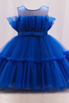 Modsele blue girl party dress features with sheer rounded neckline, bow belt at waist and multi-layer skirt.
Product Details:

SKU:PD1996
Tulle Material
Knee Length
Size: Child 2-14. True to size chart. Check our Size Chart to get your correct size. 
Our child size is not according to age or height.
Recommend custom size for plus size.
Free custom size and color service is available. Email your exact measurements and color number once order is placed. 
Fully lined 
Processing time: 5-15 business days. 

Feel free to contact our customer service: contact@modsele.com if you have any questions. Dresses Church, Tulle Material, Bow Belt, Blue Tulle, Kids Designer Dresses, Girls Party Dress, Layered Skirt, Girl Party, Baby Dress