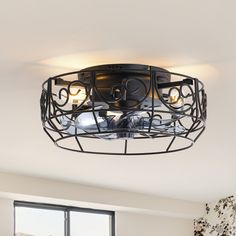 a light fixture in the middle of a room