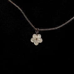 this delicate mother of pearl sampaguita pendant is handmade with care, featuring sampaguita flowers. each piece is uniquely crafted, showcasing the natural variations of mother of pearl and the artistry that makes every pendant one of a kind. paired with a matching chain, this pendant adds a touch of elegance and meaning to any outfit. your order will be packaged in a gift box, ready for gifting or safekeeping. ✨ please note: *due to the handmade nature of this piece, slight variations in desig Flower Shaped Pearl Pendant Necklace For Gift, Minimalist Handmade Charm Necklace With Flower Pendant, Handmade White Charm Necklace For Her, Minimalist Handmade Flower Pendant Charm Necklace, Handmade White Charm Necklace As Gift For Her, Unique White Jewelry With Flower Charm, Dainty Handmade Small Necklace, Small White Dainty Jewelry, Handmade White Flower Pendant Necklace