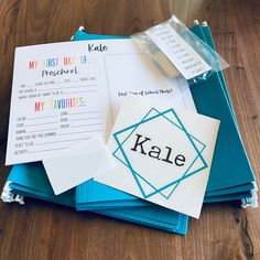 a pile of personalized notepads with the word kale written on them