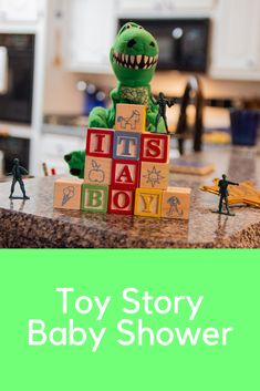 toy story baby shower with dinosaur and blocks