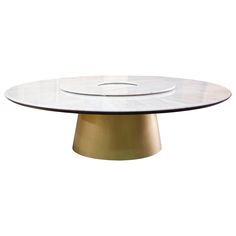 an oval table with a white top and gold base, on a white background in the shape of a circle