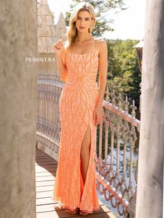 Primavera Couture 3959 This is a coral fully sequined prom dress. It features a starburst in the front of the dress with waterfall streaming sequins up and down the long length of the dress. It has a corset open back and a side slit, Available Size: 2, 10 Available Colors: Coral Coral Prom Dresses, Scoop Neck Prom Dress, Coral Prom Dress, Backless Evening Gowns, Unique Prom Dresses, Couture Dress, Bride Squad, Backless Prom Dresses, Floor Length Skirt