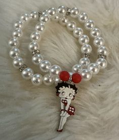 White imitation pearl set with Betty Boop inspired charm Vintage White Pearl Bracelet With Round Beads, Betty Boop Jewelry, White Beaded Bracelet, White Beads Bracelet, Betty Boop Art, White Purses, Pearl Set, Bead Charm Bracelet, White Beads