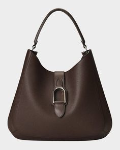 a brown handbag with a metal buckle