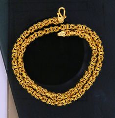 22karat yellow gold handmade unisex 916 hallmarked chain necklace fabulous stylish gifting jewelry  Weight-chart 20"->26.800 grams approx. 22"->29.490 grams approx. 24"->32.200 gramas approx. Metal-22 karat yellow gold. length-20 inches approx. Width-4.5 to 6 mm approx. Marking-916/22k hallmarked sign/stamp Brand-Traditional-jewellery. makes excellent gift item and collection piece  more information please see the photo's. silver & gold jewelry is handmade designer jewelry. so, there can be slight difference in size and weight of the article in the comparison of the description.. Byzantine Chain, Belly Dance Jewelry, Silver Gold Jewelry, Designer Handmade Jewellery, Mens Gold Bracelets, Gold Chains For Men, Bridal Gold Jewellery Designs, Rajasthan India, Bridal Gold Jewellery