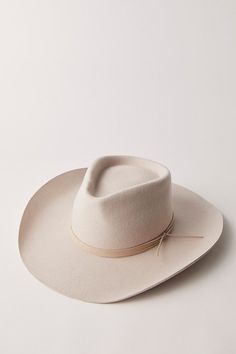 A classic cowboy hat featured in a soft wool felt fabrication and structured silhouette with an upturned brim and teardrop crown. **Features:** Soft wool felt fabrication, structured design, upturned brim, teardrop crown, classic cowboy silhouette **Why We ❤ It:** This effortlessly cool cowboy hat adds the perfect western-inspired touch to every outfit. | Walk The Line Cowboy Hat by Wyeth at Free People in White Kemo Sabe Hats, Womens Western Hat, Womens Western Hats, Bone Hat, Cool Cowboy, Cowboy Silhouette, Classic Cowboy, Nashville Outfits, Structured Design