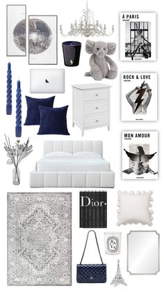 a white and blue bedroom with pictures on the wall, pillows, rugs, lamp, mirror, chandelier