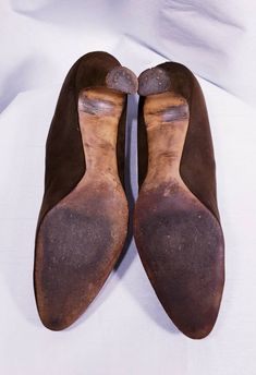 These solid 1900's ~ 1920's suede shoes are amazing! Attached to this pair of shoes is a steel cut buckle. Beautiful chocolate brown suede shoes are very wearable. Shoes are a size 7 1/2 aaa Measurements Length is 9 1/4 inches, width is 2 1/2 inches and heel is 2 1/2 inches. Incredible gently worn condition. Insole reads: Made for Sommer & Kaufman San Francisco Buyer to pay all related shipping charges. Questions Welcomed and Reasonable Offers considered Thank You Cityvintage Vintage Closed Toe Heels For Fall, Fall Vintage Closed Toe Heels, Vintage Almond Toe Heels For Fall, Vintage Evening Heels For Fall, Vintage Suede Heels With Almond Toe, Vintage Suede Heels With Low Heel, Vintage Suede Low Heel Heels, Fitted Brown Vintage Heels, Vintage Heels For Formal Fall Occasions