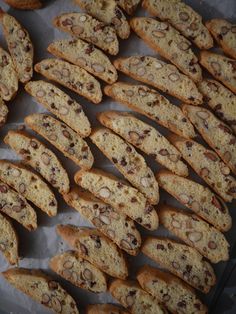 many pieces of bread with nuts on them