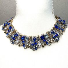 Royal Blue Rhinestone Statement Necklace That Is Thicker And More Of A Collard Necklace Rather Than A Low Hanging Necklace. Extra Fancy And Eye Catching. Nwt Blue Crystal Rhinestone Necklace For Wedding, Blue Jeweled Party Jewelry, Blue Crystal Necklaces With Bling, Blue Crystal Jewelry With Bling, Elegant Blue Rhinestone Necklace With Sparkling Stones, Elegant Blue Crystal Rhinestone Necklace, Blue Party Necklace With Bling, Sapphire Rhinestone Party Necklace, Blue Crystal Rhinestone Necklace For Party