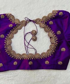 Hand embroidered ready made saree blouse / crop top/stitched saree blouse usa / purple U neck  saree blouse/ hand embroidered blouse/zardosi blouse/U neck  saree blouse/ purple pure silk blouse/ maggam work blouse        It is very true that a perfect blouse is the one which makes your saree look stand out !! If you find one of such a style that you have been wanting to have then dont let it go !! we carry such unique trending blouses that instantly add a stylish look to any saree !!     Well..!! we understand that you may not get in your desired size/pattern, here you go with customization according to your size/pattern which we can deliver in 1-2 weeks of time period !!      Here is a beautiful Hand embroidered saree blouse in purple color that has simple cutwork embroidery on necks and Cheap Bohemian Blouse With Zari Work, Luxury Purple Embroidered Blouse Piece, Simple Handwork On Blouse, Embroidered Purple Dola Silk Blouse Piece, Purple Embroidered Art Silk Choli, Purple Art Silk Traditional Wear With Intricate Embroidery, Diwali Purple Blouse With Intricate Embroidery, Embroidered Art Silk Purple Blouse Piece, Purple Raw Silk Blouse Piece With Resham Embroidery