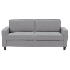 a gray couch sitting on top of a white floor