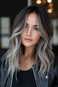 Two-tone hair colors offer brunettes an exciting way to experiment with their look, especially with shorter cuts. Caramel or honey highlights give a warm contrast, while silver or pastel tones provide a cool, modern edge. Dip-dye, with color at the ends, or balayage that blends seamlessly are top picks. This coloring approach adds dimension and freshness to your style, making it an excellent choice for anyone wanting to try something different. Long Dark Hair With Blonde Money Piece, Dark Ash Blonde Ombre, Ash Blonde Highlights With Dark Roots, Ashy Short Hair, Hair Color For Light Brunettes, Easy To Manage Blonde Hair, Brunette Hair With Beige Highlights, Covering Up Grey Hair Brunette, Ash Blonde Teasy Lights