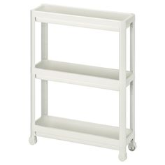 a white shelf with two shelves on each side and wheels to the bottom, against a white background