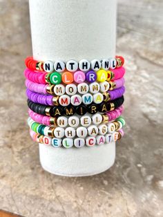 Celebrate unity with our Custom Friendship Bracelets! Available in bulk quantities of 1, 25, 100, or 1000, these personalized name bracelets are perfect for team events, gatherings, or as thoughtful bulk gifts. Each beaded bracelet can be customized with a name or meaningful word (up to 12 characters), making them unique keepsakes for friends and teammates. Crafted with quality materials, our custom bead bracelets combine style and durability. Enjoy fast shipping and exceptional craftsmanship wi Bead Name Bracelets, Bulk Gifts, Team Bracelets, Name Bracelets, Jewelry Care Instructions, Halloween Event, Bracelet Beaded, Name Bracelet, Custom Bracelets