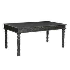 a black table sitting on top of a white floor