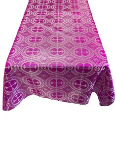 a purple table cloth with an intricate design on it