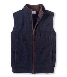 Inspired by the first waterfowl sweater we offered in the 1930s, the naturally water-repellent merino wool Waterfowl Sweater Vest is a practical midlayer that duck hunters rely upon in raw wet conditions. Traditional Fit: Relaxed through the chest, sleeve and waist. 100% merino wool body. Handwash, dry flat. Shoulder shooting patches integrated into the knit for durability. Fleece-lined handwarmer pockets. Soft microsuede collar lining. Easy-to-grasp leather zipper pull. Imported. Vest Sweaters, Mens Vest Fashion, Men Vest, Man Room, Knit Men, Men's Jackets, Wool Vest, Men Clothes, Outerwear Vest