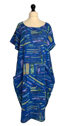 . Made from 100% cotton in a vibrant quirky stripe pattern , loose fitting shift dress style with short sleeves and 2 side hip pockets . One size - to fit UK sizes 14 16 18 20 . Bust measures : 48 inches . Length from back of neck to bottom hem : 40 inches . Brand new with tags . Visit our shop for lots more gorgeous quirky lagenlook fashion !! Blue Oversized Short Sleeve Dress, Oversized Blue Short Sleeve Dress, Striped Short Sleeve Dresses With Pockets, Blue Short Sleeve Lagenlook Dress, Blue Cotton Dress With Side Pockets, Blue Short Sleeve Dress With Side Pockets, Shift Dress Styles, Lagenlook Style, Couture Mode