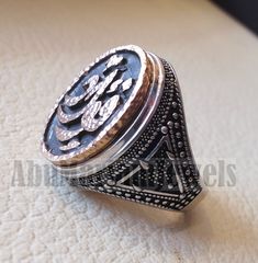 Customized Arabic calligraphy names ring personalized antique jewelry style sterling silver 925 and bronze all size TSB1004 خاتم اسم تفصيل This is made to order item please allow 2 - 3 weeks before shipping . Any name can be applied one or two parts . Please write the name/s in the order notes in Arabic or English . A sketch drawing ( see Pics ) will be sent to you after 2 - 5 days from order before we proceed to production . Ring face dimensions 21 mm X 16 mm Sterling silver 925 is used and bro Antique Oxidized Finish Engraved Ring As Gift, Antique Oxidized Finish Signet Ring As Gift, Antique Oxidized Finish Signet Ring For Gift, Handmade Antique Silver Engraved Ring, Traditional Engraved Signet Ring For Anniversary, Antique Engraved Ring With Antique Finish As Gift, Antique Engraved Ring As Gift With Antique Finish, Anniversary Engraved Bronze Ring, Traditional Silver Signet Ring For Anniversary